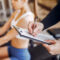 A Beautiful Sports Couple Is Engaged In A Gym